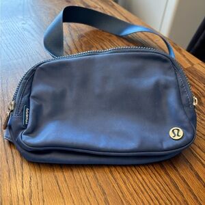Lululemon Athletica Blue Crossbody/Belt Bag with silver Accent